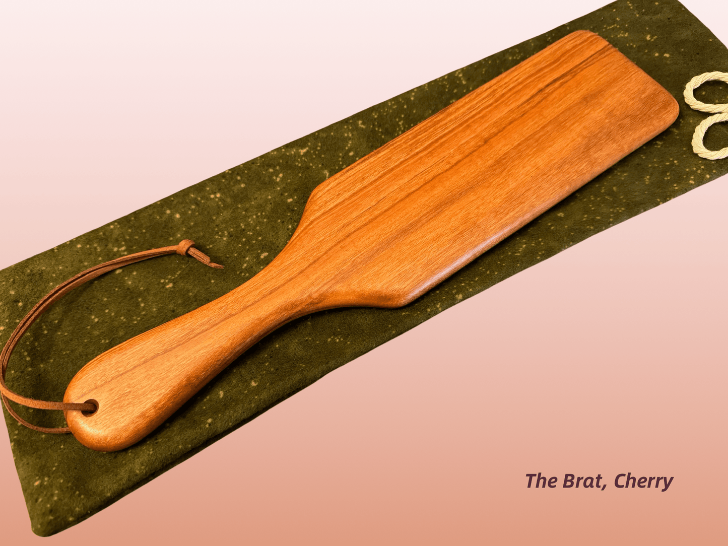 The Brat is a half-size frat paddle by LRS Toys - great for OTK spanking and all spanking positions