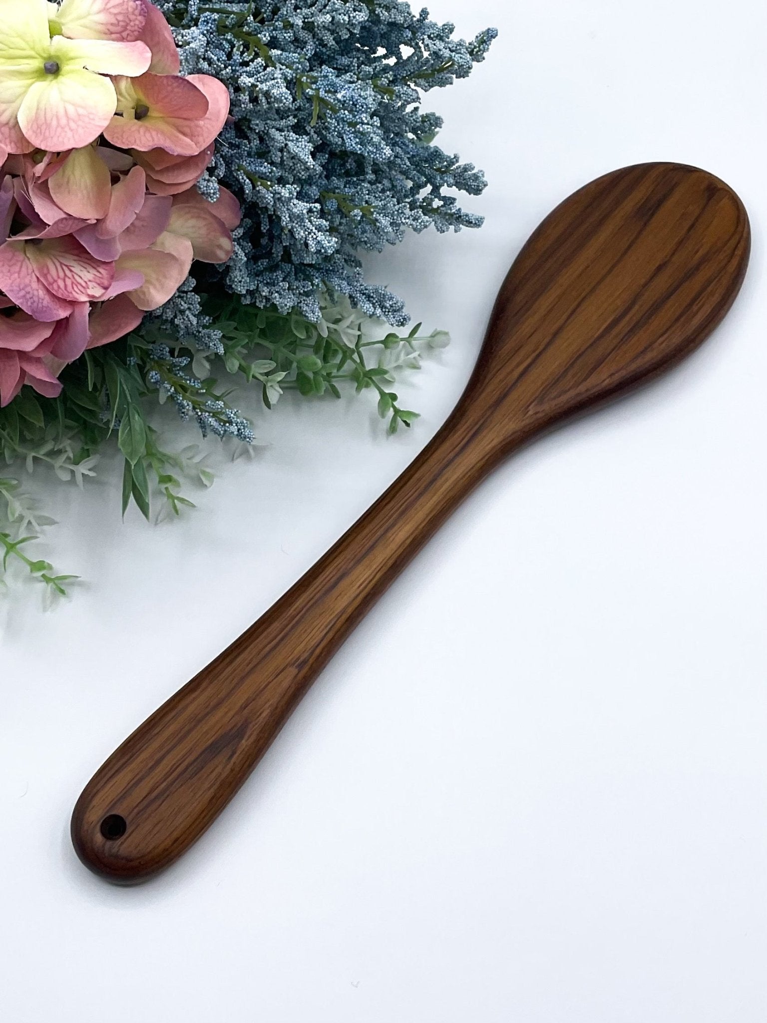 This spanking paddle by LRS Toys is made from genuine teak and will be a unique addition to any spanking toy collection