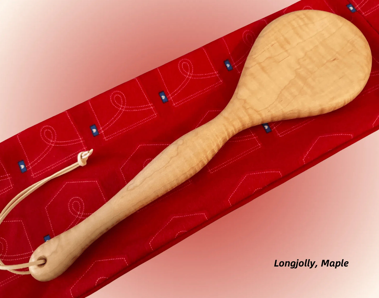 Longjolly spanking paddle pictured in Maple