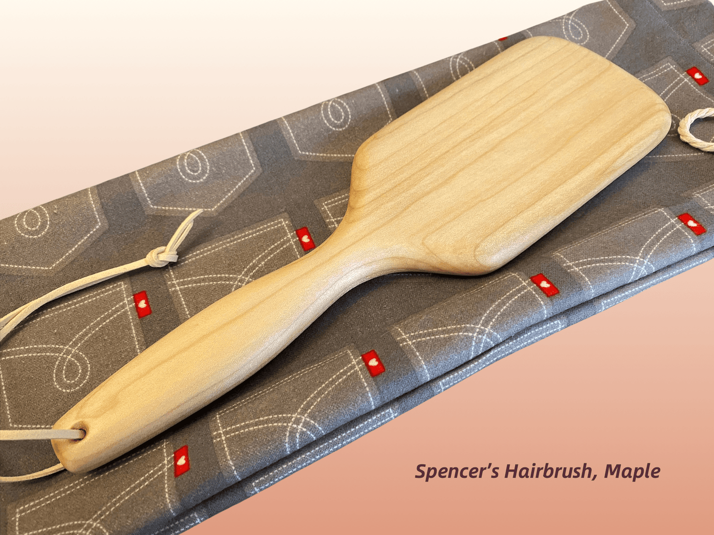 Spencer's Hairbrush by LRS Toys is a classic hairbrush spanking paddle available in your choice of hardwoods