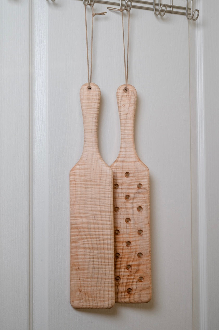 ATP Frat Paddles pictured in Flame Maple. No Hole option on left, option with Holes on right. 