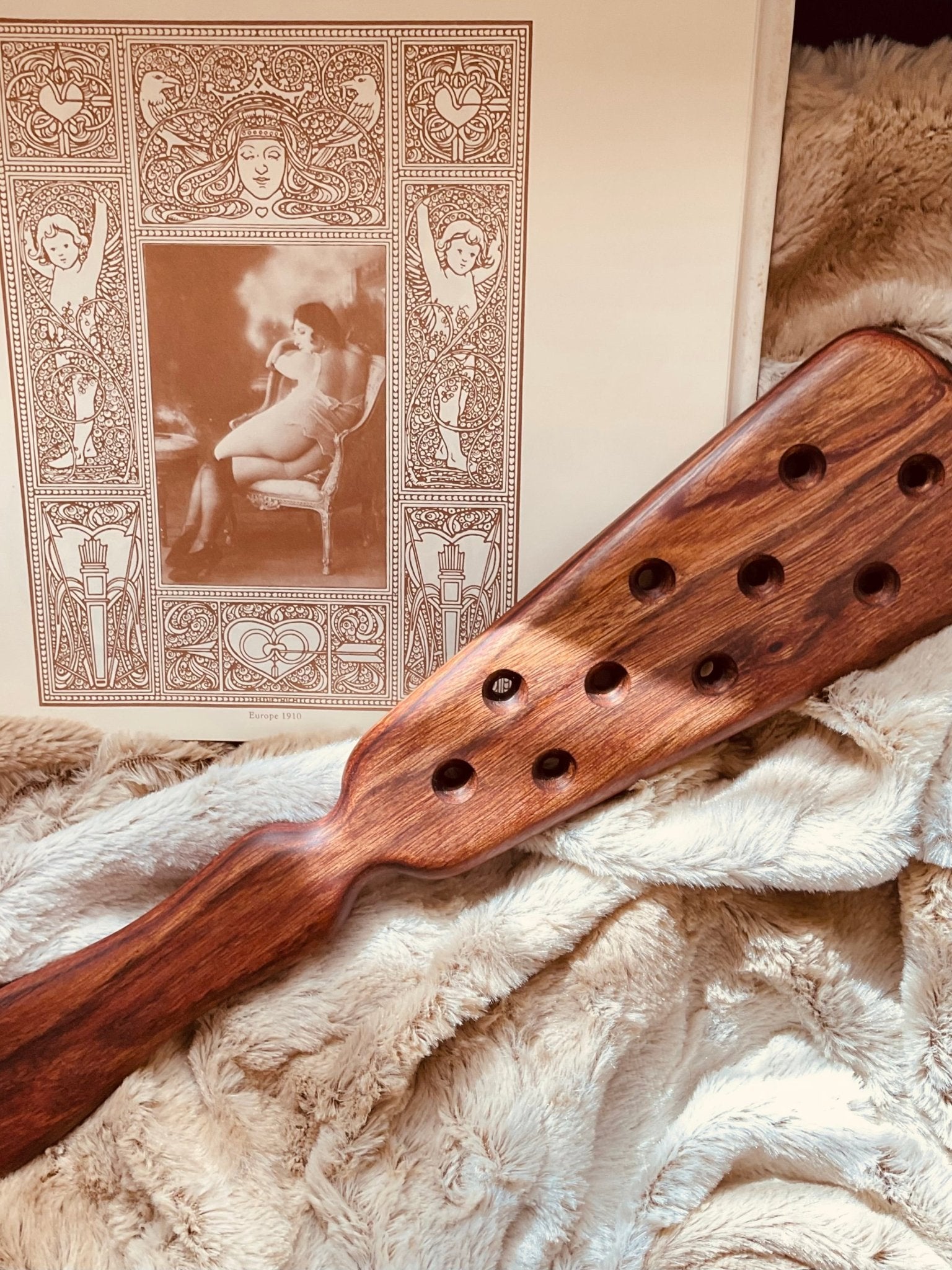 The Edwardian spanking paddle by LRS Toys pictured in Caribbean Rosewood